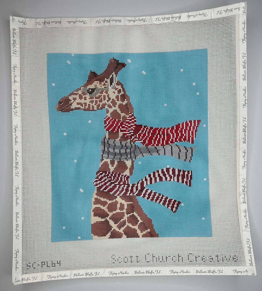 Giraffe With Scarves 